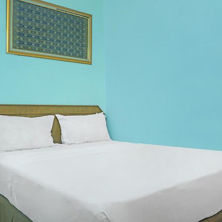 Super Oyo Collection O 92690 Hotel Limas 巨港 外观 照片