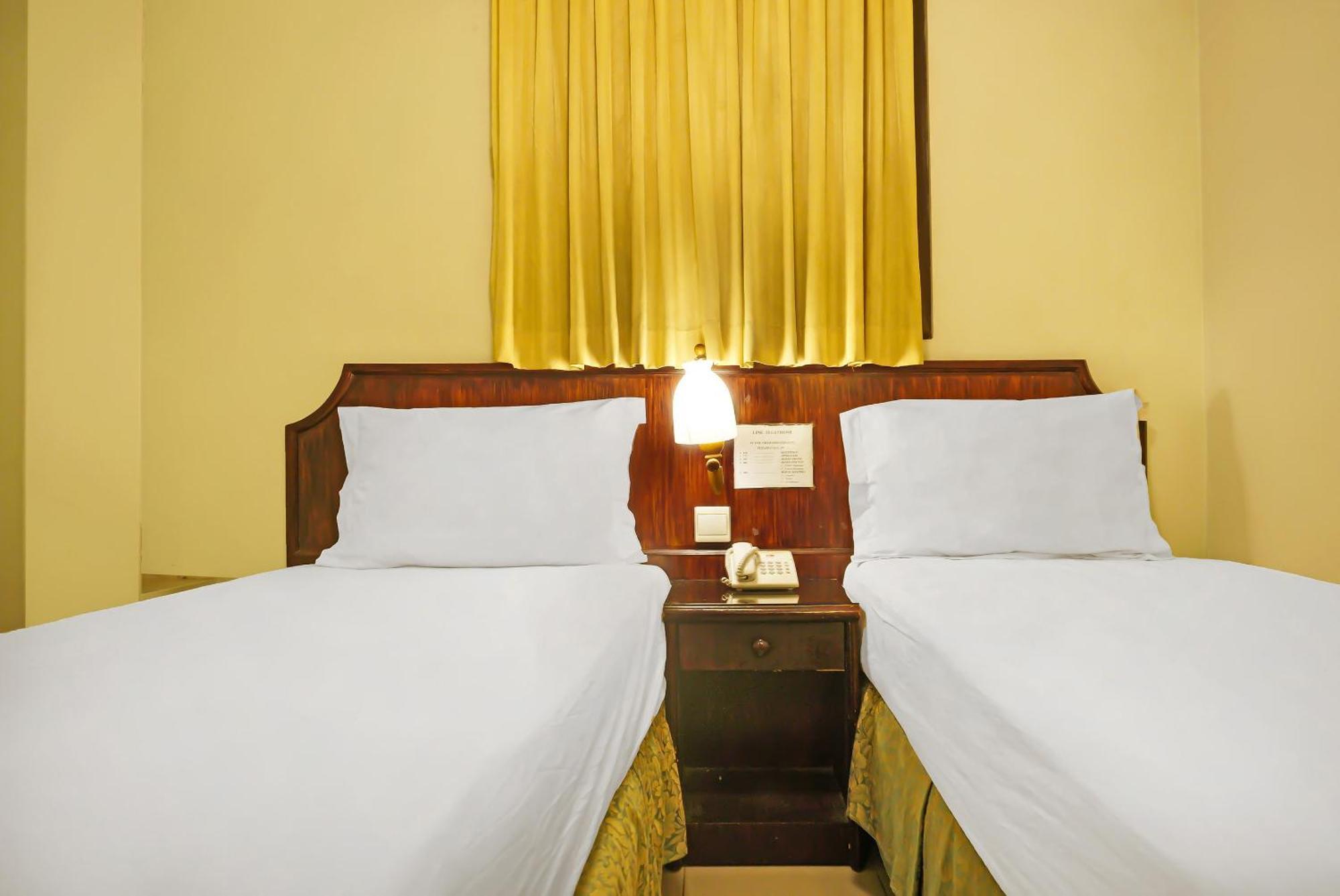 Super Oyo Collection O 92690 Hotel Limas 巨港 外观 照片