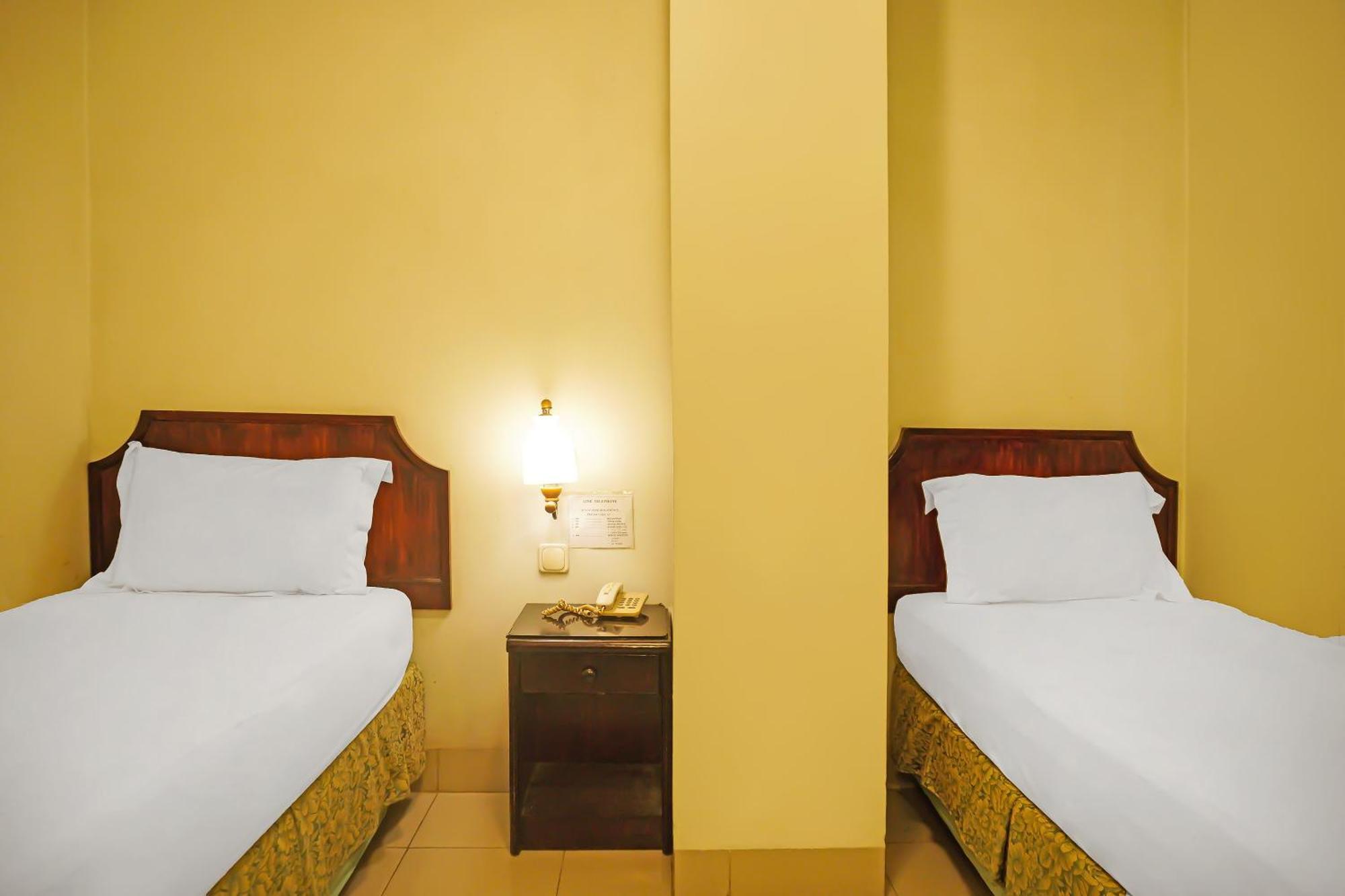 Super Oyo Collection O 92690 Hotel Limas 巨港 外观 照片