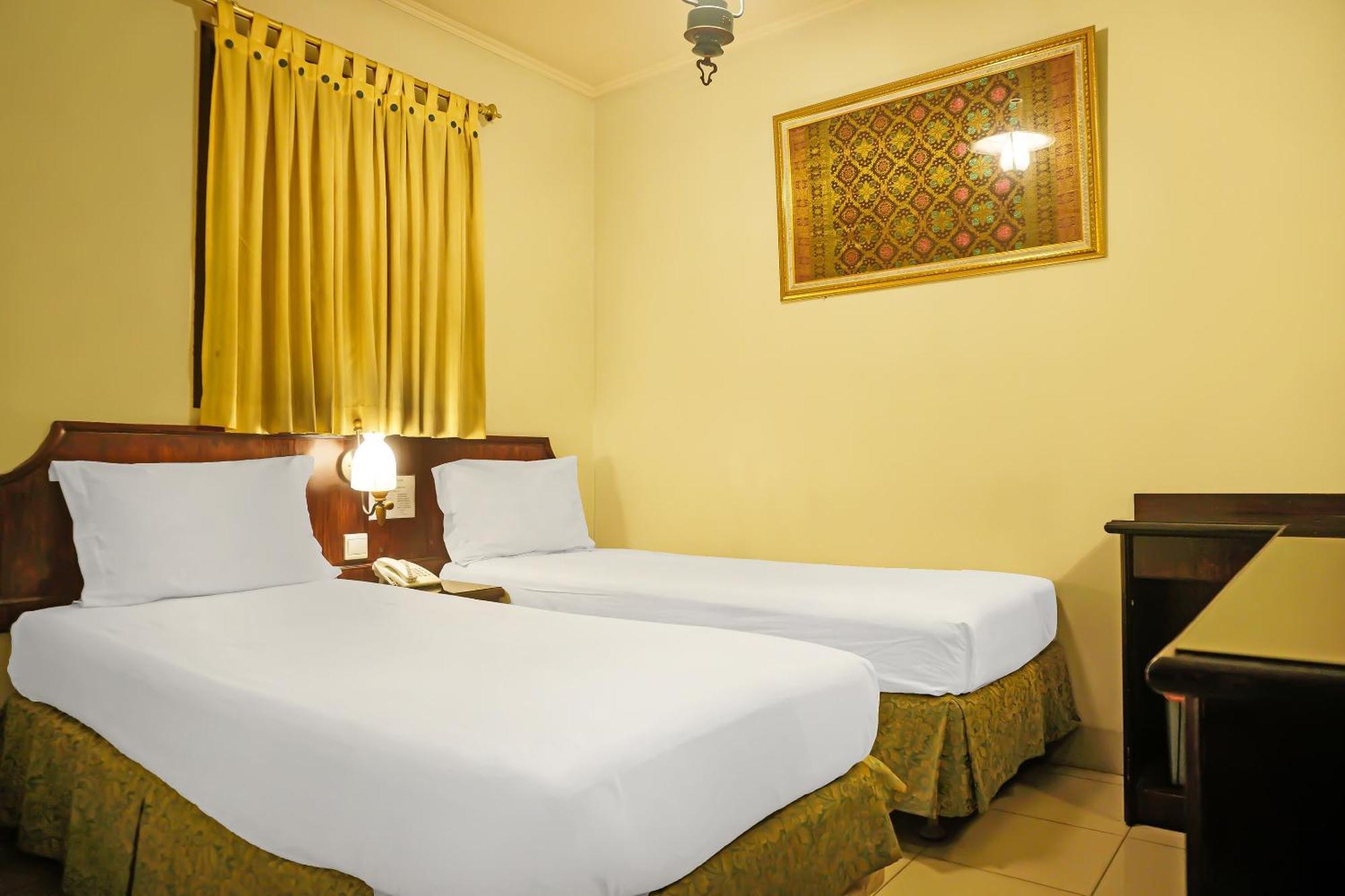 Super Oyo Collection O 92690 Hotel Limas 巨港 外观 照片
