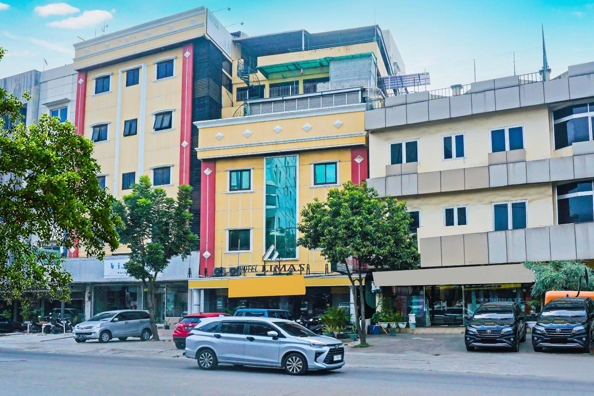 Super Oyo Collection O 92690 Hotel Limas 巨港 外观 照片