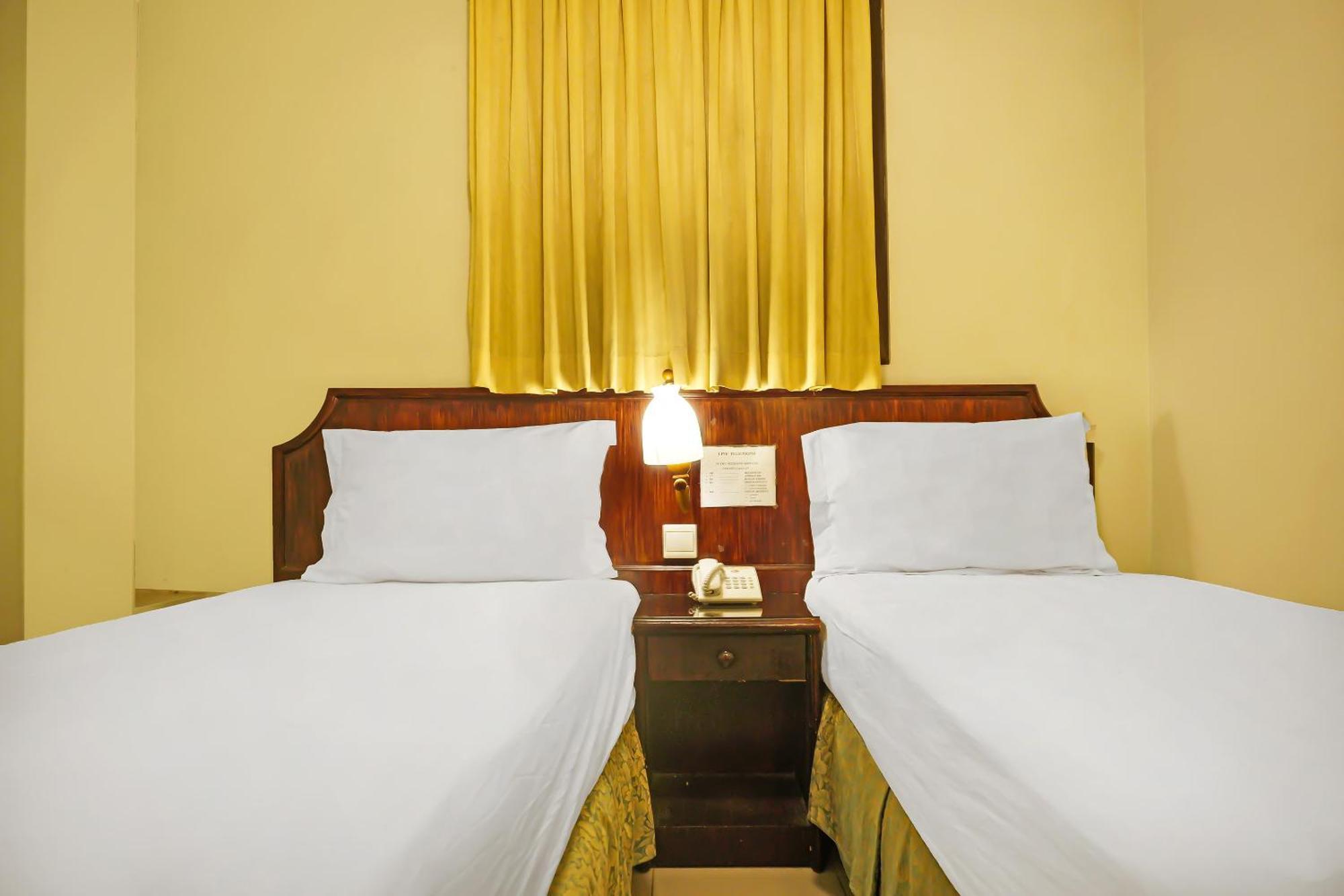 Super Oyo Collection O 92690 Hotel Limas 巨港 外观 照片
